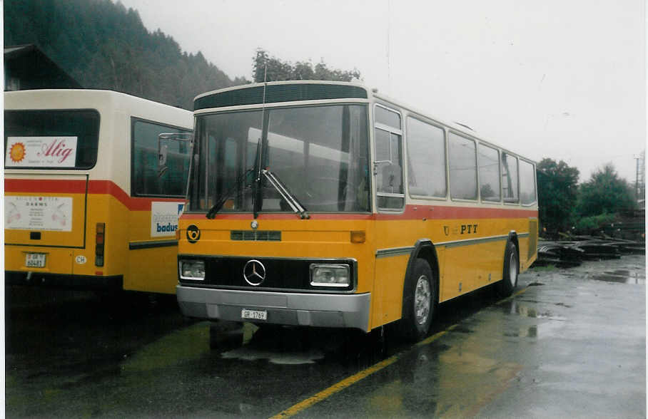 (018'328) - Zazzi, Disentis - GR 1769 - Mercedes/T�scher am 2. August 1997 beim Bahnhof Disentis