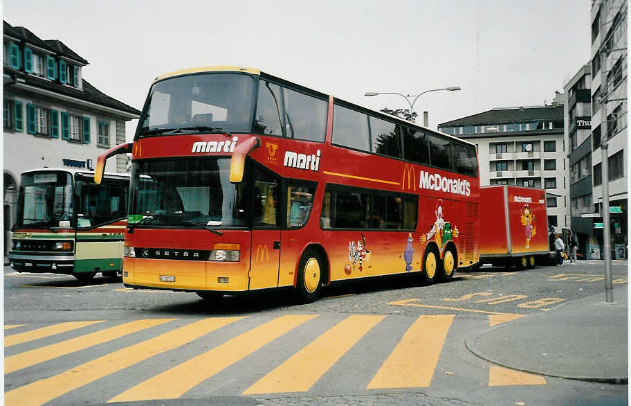 (037'308) - Marti, Kallnach - Nr. 24/BE 102'224 - Setra am 12. Oktober 1999 beim Bahnhof Thun