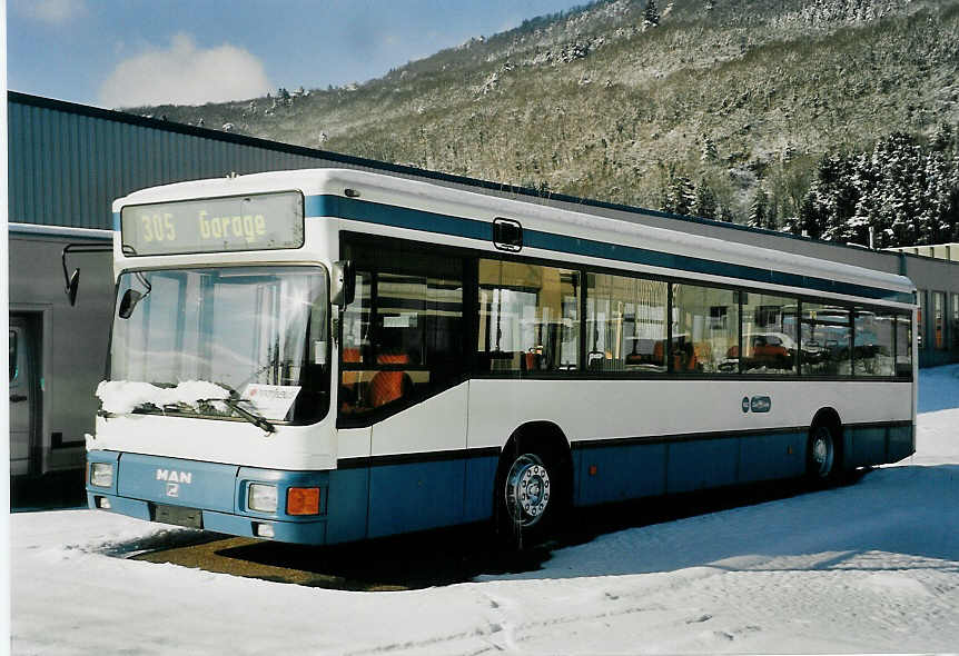 (058'634) - H�rzeler, Dietikon - Nr. 11 - MAN am 1. Februar 2003 in Biel, Rattinbus