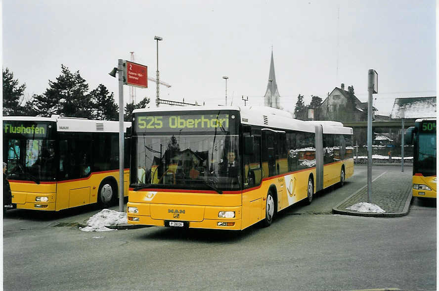 (058'901) - PTT-Regie - P 26'016 - MAN am 20. Februar 2003 beim Bahnhof B�lach