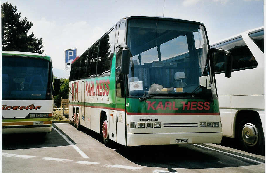 (061'318) - Hess K., Luzern - Nr. 43/LU 15'554 - Dr�gm�ller am 7. Juli 2003 beim Bahnhof Interlaken West 
