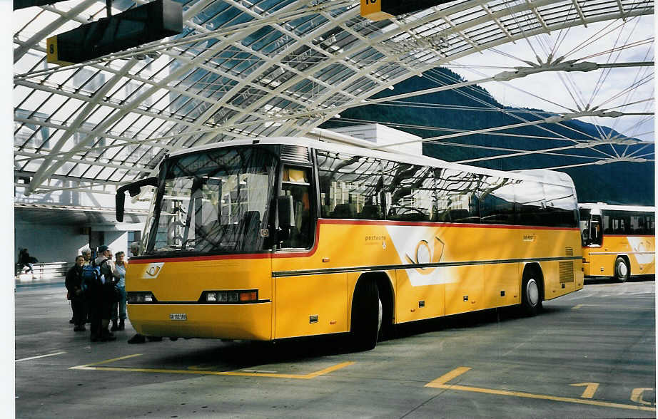 (062'210) - PostAuto Graub�nden - GR 102'389 - Neoplan (ex P 25'856) am 29. Juli 2003 in Chur, Postautostation