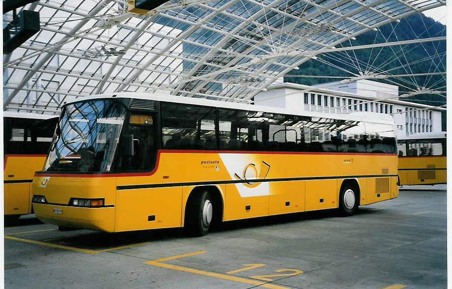 (062'214) - PostAuto Graub�nden - GR 102'377 - Neoplan (ex P 25'118) am 29. Juli 2003 in Chur, Postautostation
