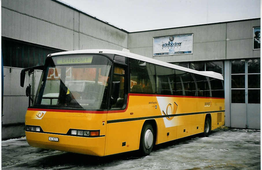 (065'404) - Geissmann, H�gglingen - AG 8571 - Neoplan am 7. Februar 2004 in Adelboden, Mineralquelle