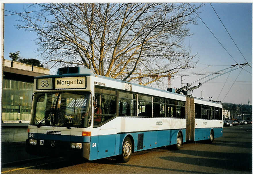 (065'626) - VBZ Z�rich - Nr. 34 - Mercedes Gelenktrolleybus am 16. Februar 2004 beim Bahnhof Z�rich-Tiefenbrunnen