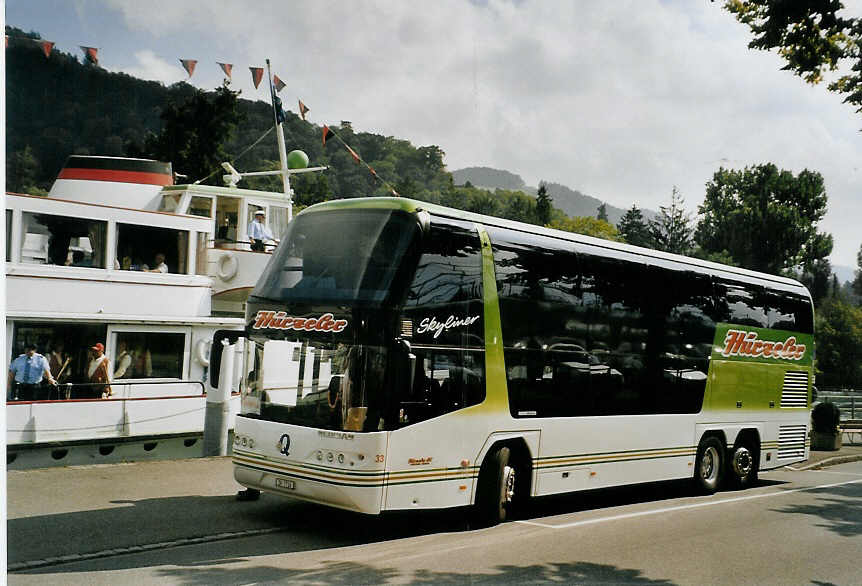 (080'411) - H�rzeler, Dietikon - Nr. 33/ZH 7716 - Neoplan am 14. September 2005 bei der Schiffl�ndte Thun