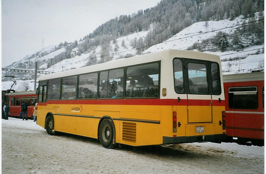 (082'412) - PostAuto Graub�nden - GR 102'340 - NAW/Hess (ex P 24'456) am 1. Januar 2006 beim Bahnhof Scuol-Tarasp