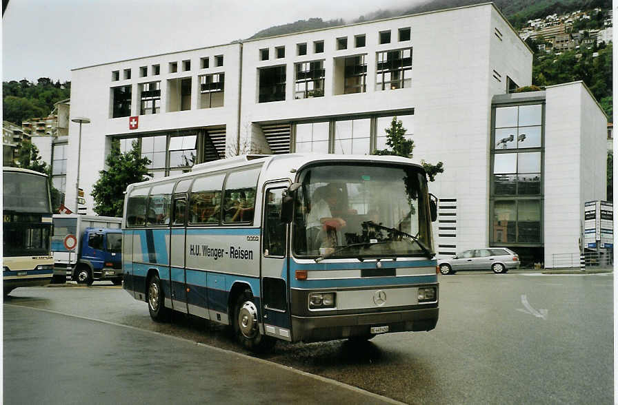 (088'700) - Wenger, Fahrni - BE 449'450 - Mercedes (ex Famo, S�deren) am 3. August 2006 beim Bahnhof Locarno