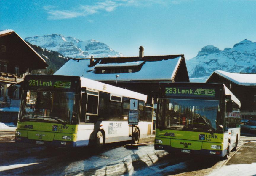 (113'321) - AFA Adelboden - Nr. 56/BE 611'030 + Nr. 55/BE 611'055 - MAN/G�ppel am 24. Dezember 2008 beim Bahnhof Lenk