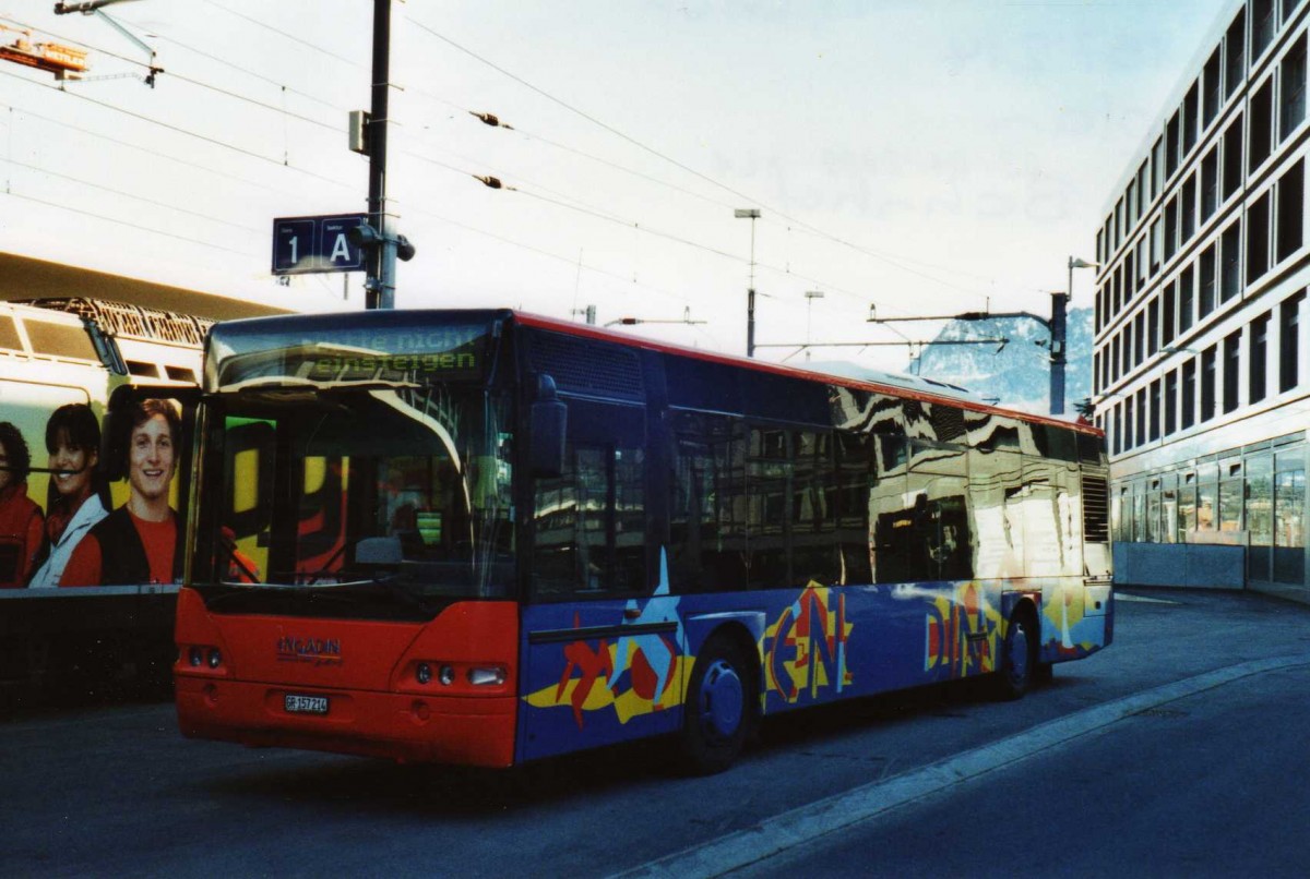 (115'034) - SBC Chur - Nr. 214/GR 157'214 - Neoplan am 14. M�rz 2009 beim Bahnhof Chur
