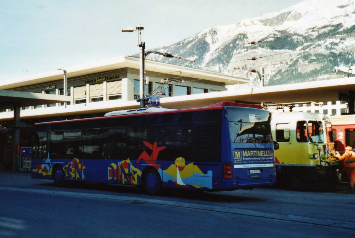 (115'035) - SBC Chur - Nr. 214/GR 157'214 - Neoplan am 14. M�rz 2009 beim Bahnhof Chur