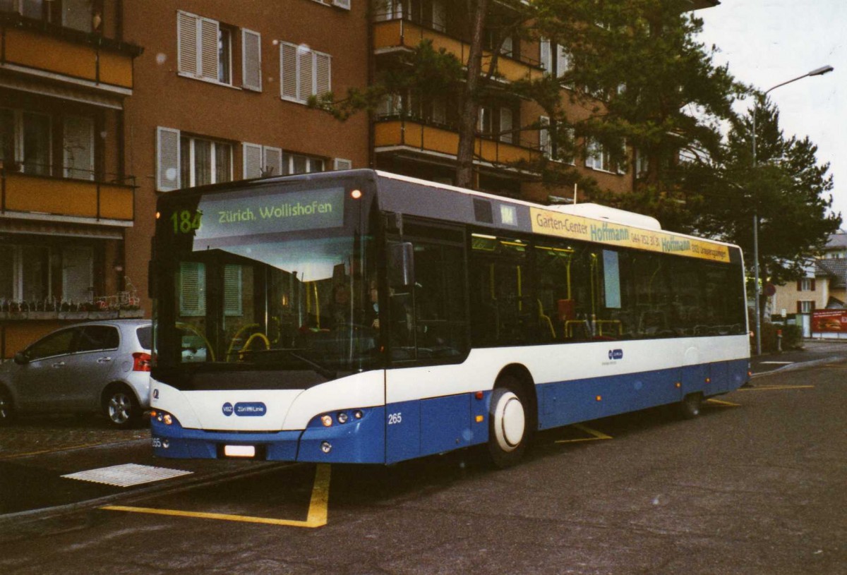 (123'026) - VBZ Z�rich - Nr. 265/ZH 726'265 - Neoplan am 13. Dezember 2009 beim Bahnhof Adliswil
