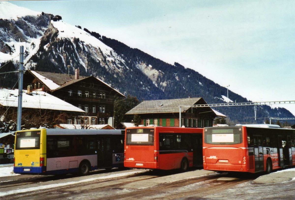 (124'233) - AFA Adelboden - Nr. 56/BE 611'030 + Nr. 55/BE 611'055 - MAN/G�ppel + Nr. 54/BE 611'056 - Neoplan (ex VBZ Z�rich Nr. 243) am 24. Januar 2010 beim Bahnhof Lenk