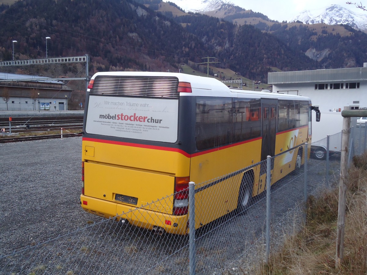 (137'105) - PostAuto Graub�nden - Neoplan (ex P 25'138) am 4. Dezember 2011 beim Bahnhof Frutigen