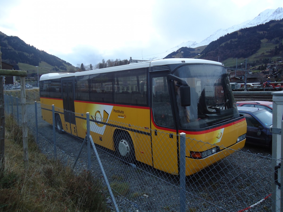 (137'106) - PostAuto Graub�nden - Neoplan (ex P 25'138) am 4. Dezember 2011 beim Bahnhof Frutigen