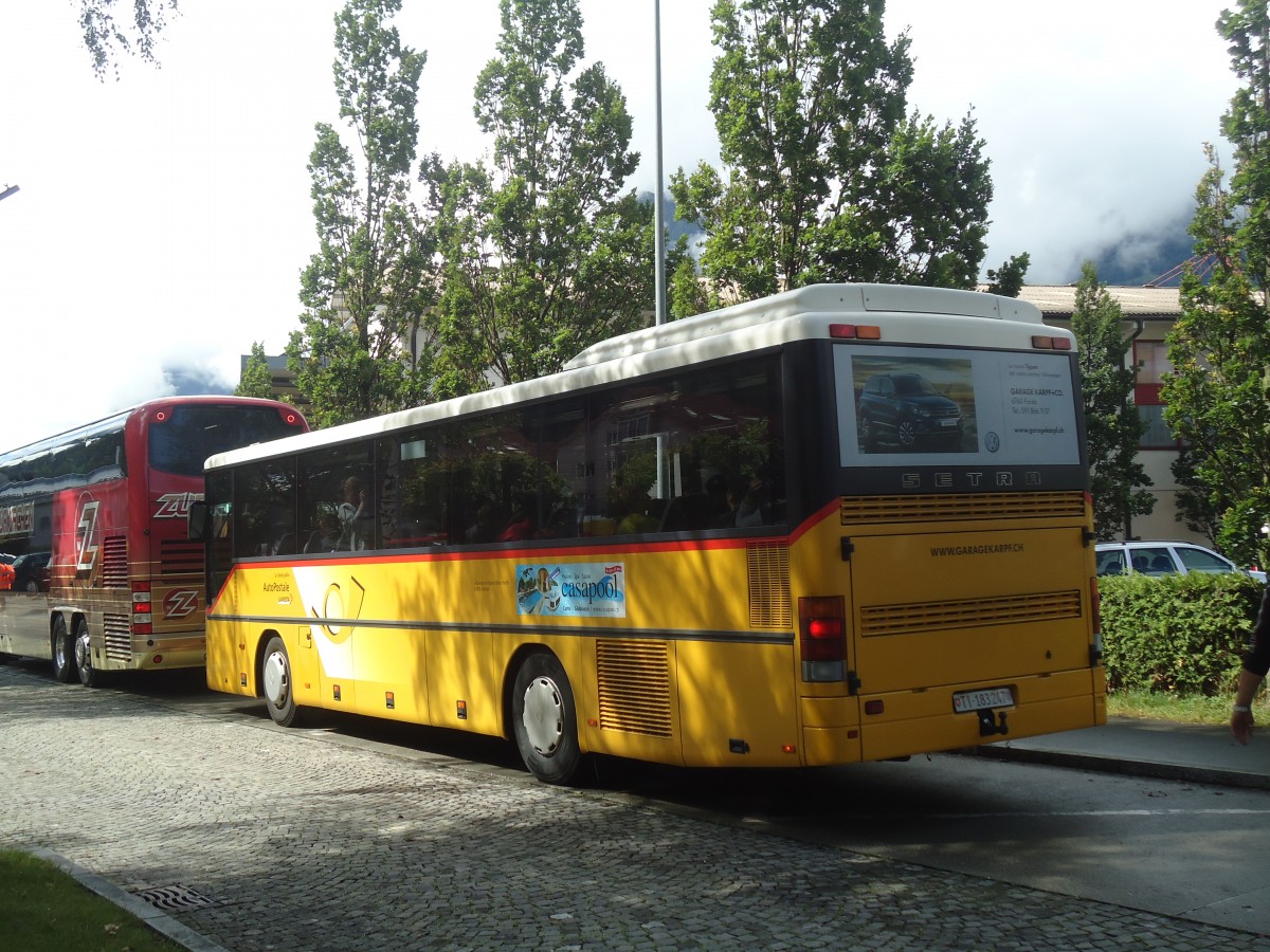 (139'384) - Marchetti, Airolo - TI 183'247 - Setra (ex Nr. 6) am 11. Juni 2012 beim Bahnhof Fl�elen