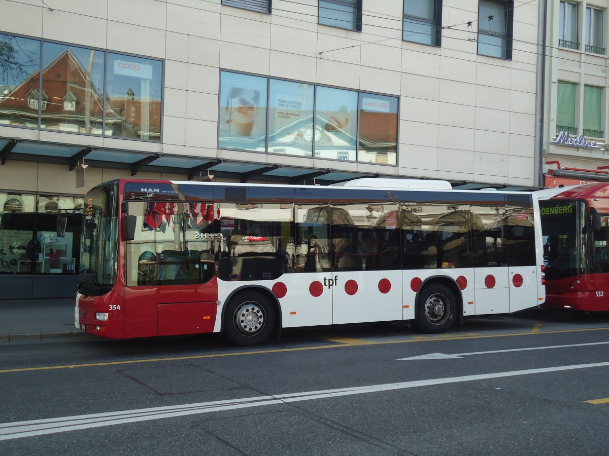 (141'244) - TPF Fribourg - Nr. 354/FR 300'405 - MAN/G�ppel am 19. August 2012 beim Bahnhof Fribourg