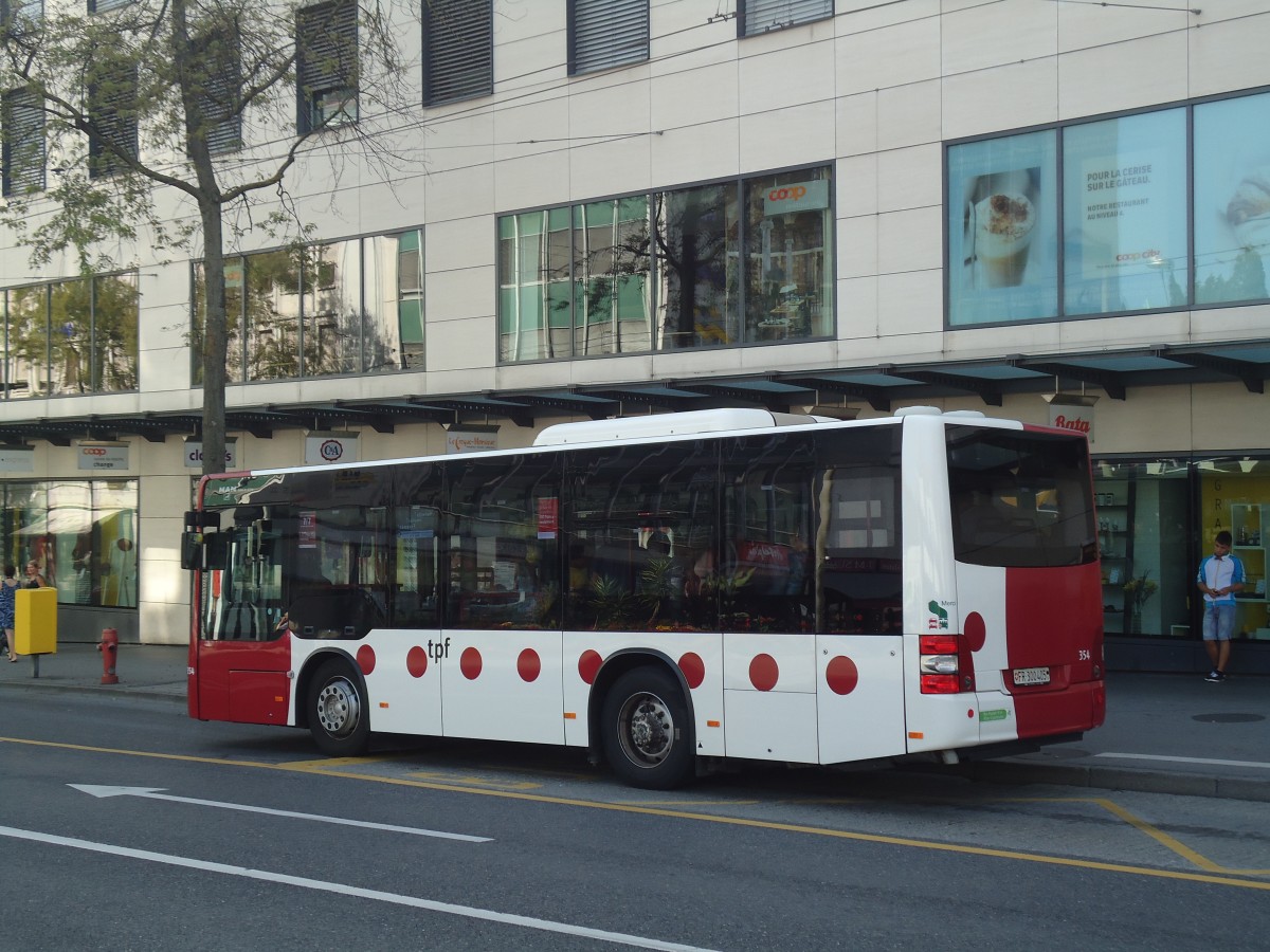 (141'259) - TPF Fribourg - Nr. 354/FR 300'405 - MAN/G�ppel am 19. August 2012 beim Bahnhof Fribourg