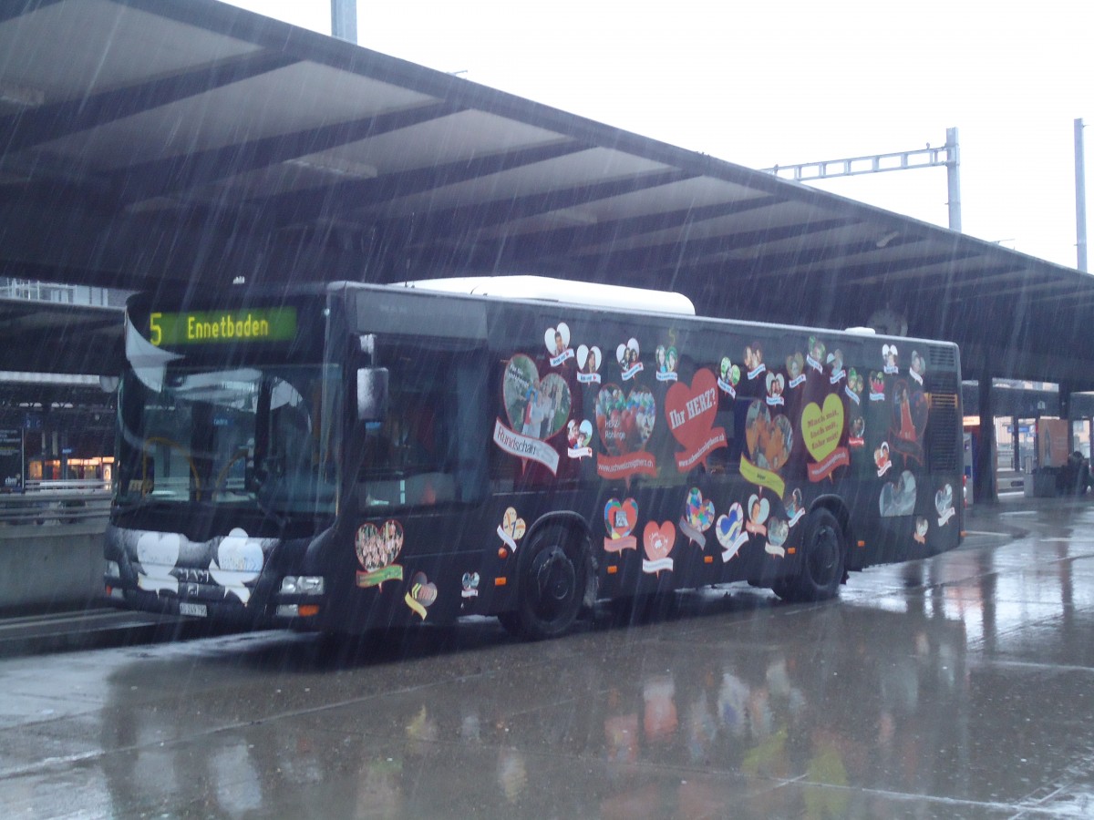 (148'457) - RVBW Wettingen - Nr. 93/AG 249'790 - MAN/G�ppel am 26. Dezember 2013 beim Bahnhof Baden