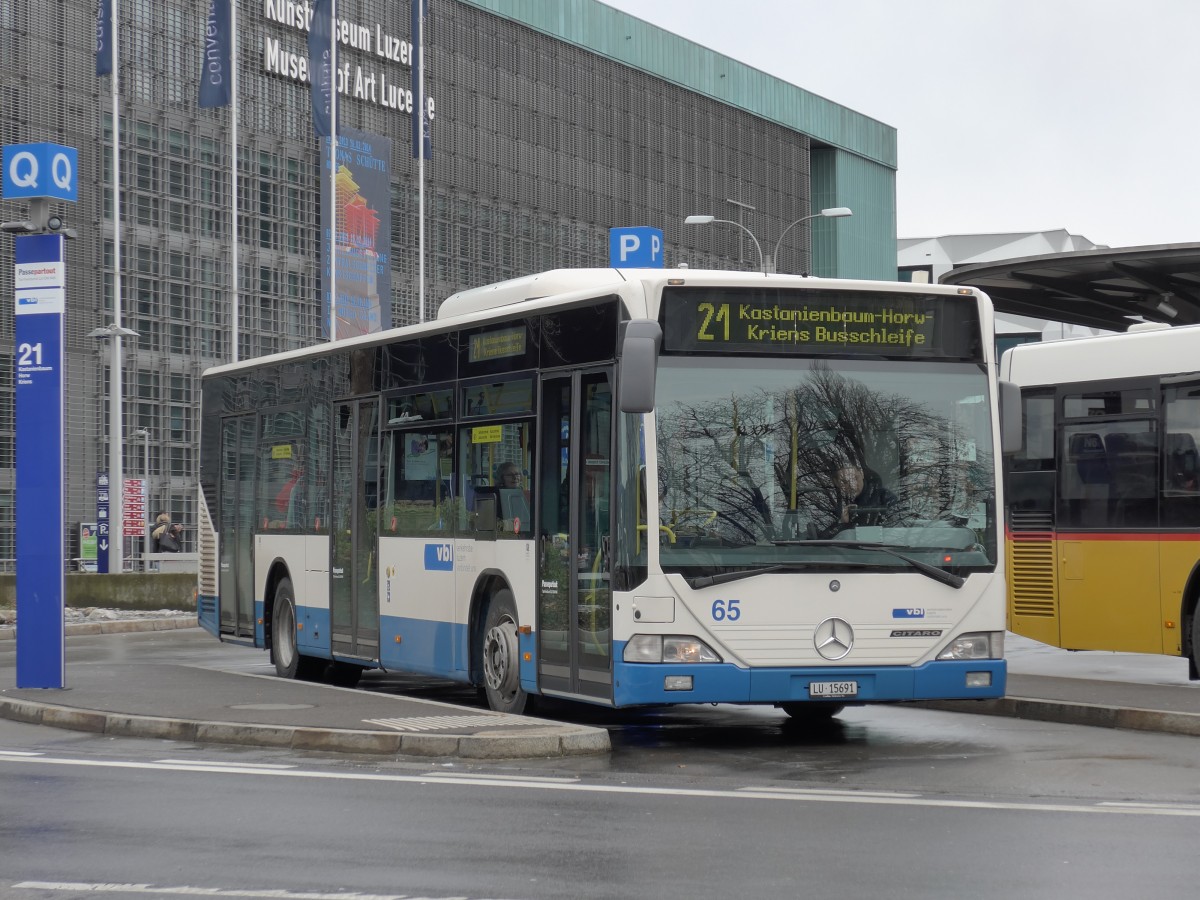 (148'915) - VBL Luzern - Nr. 65/LU 15'691 - Mercedes am 16. Februar 2014 beim Bahnhof Luzern
