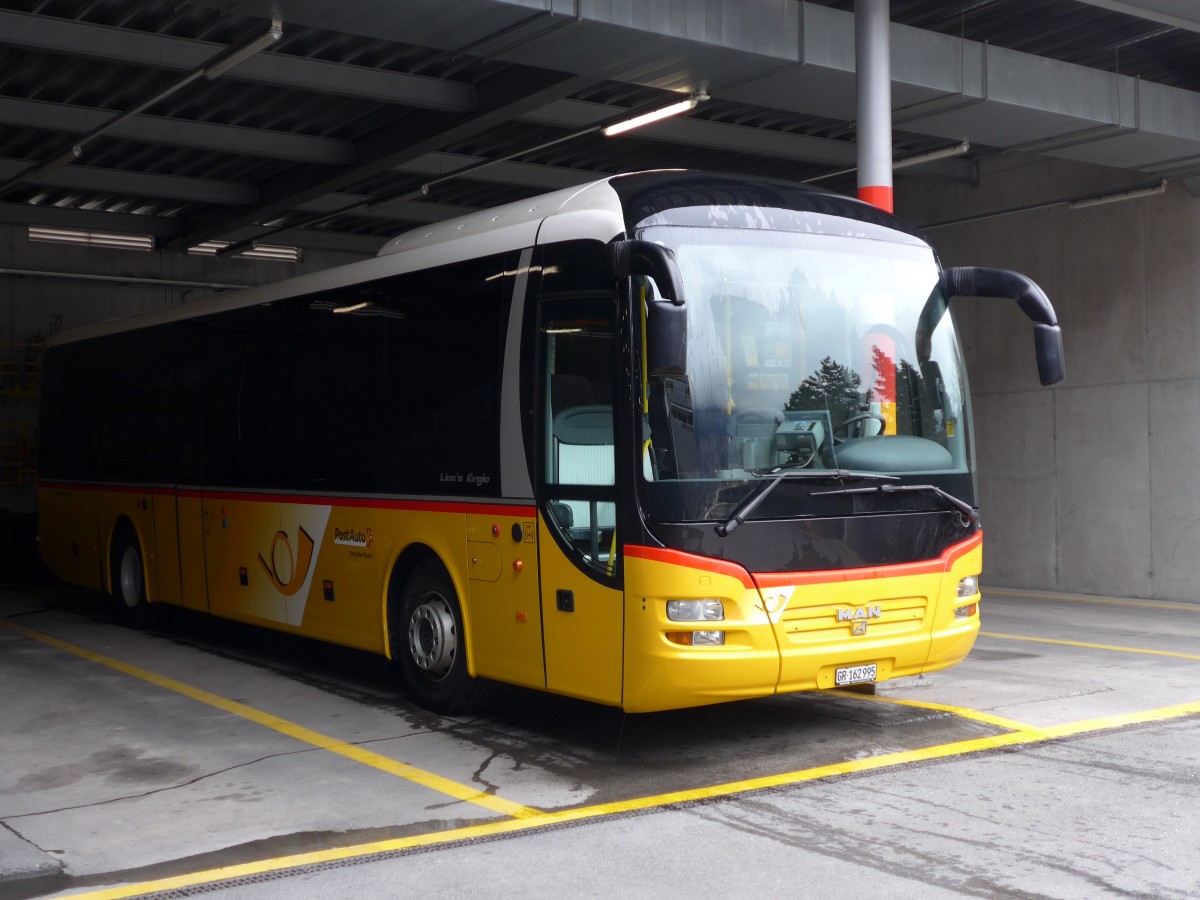 (149'116) - PostAuto Graub�nden - GR 162'995 - MAN am 1. M�rz 2014 in Chur, Garage