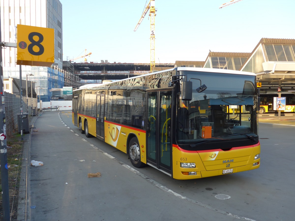 (149'179) - PostAuto Bern - Nr. 653/BE 489'253 - MAN am 9. M�rz 2014 in Bern, Postautostation