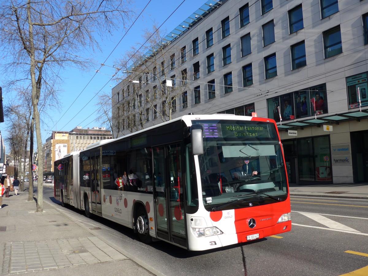 (149'282) - TPF Fribourg - Nr. 550/FR 300'425 - Mercedes am 9. M�rz 2014 beim Bahnhof Fribourg