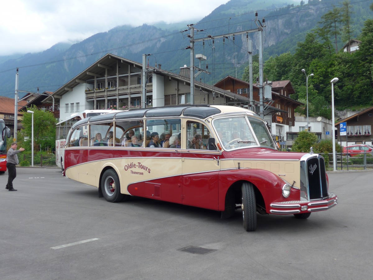 (151'555) - Reusser, Thun - BE 8484 - Saurer/R&J (ex H�sler, Menziken) am 15. Juni 2014 beim Bahnhof Brienz