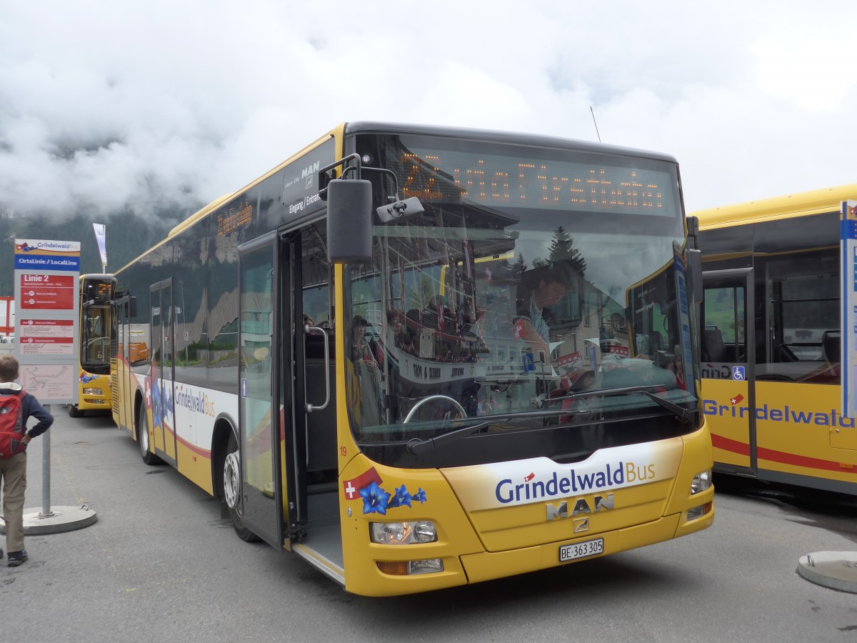 (153'549) - AVG Grindelwald - Nr. 19/BE 363'305 - MAN/G�ppel am 3. August 2014 beim Bahnhof Grindelwald