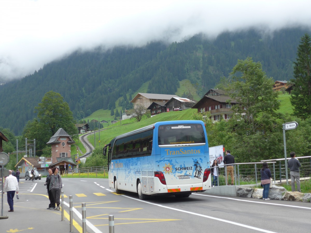 (153'577) - TranSantos, Sch�fflisdorf - ZH 695'436 - Setra am 3. August 2014 beim Bahnhof Grindelwald Grund