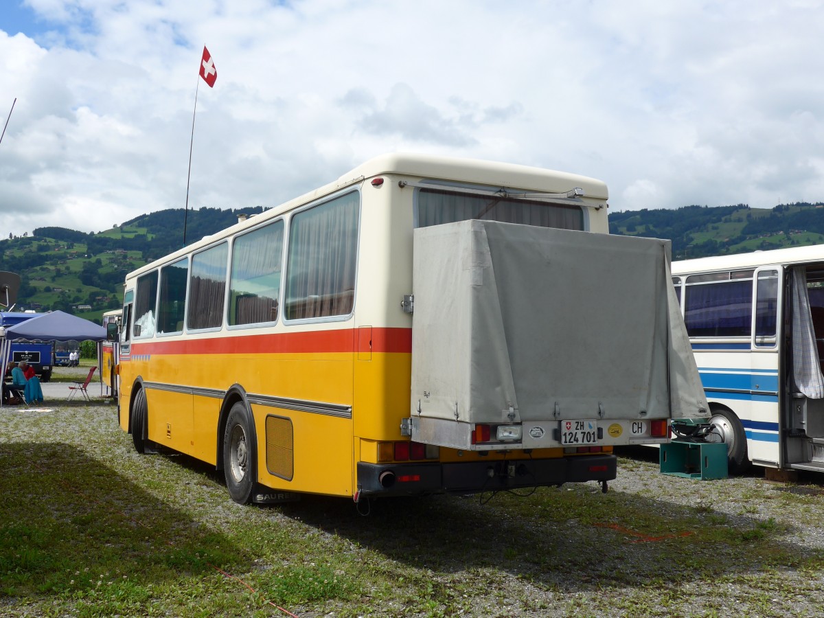 (153'874) - Toldo, Z�rich - ZH 124'701 - Saurer/R&J (ex Peter, Pfaffnau) am 16. August 2014 in Altst�tten, Allmendplatz