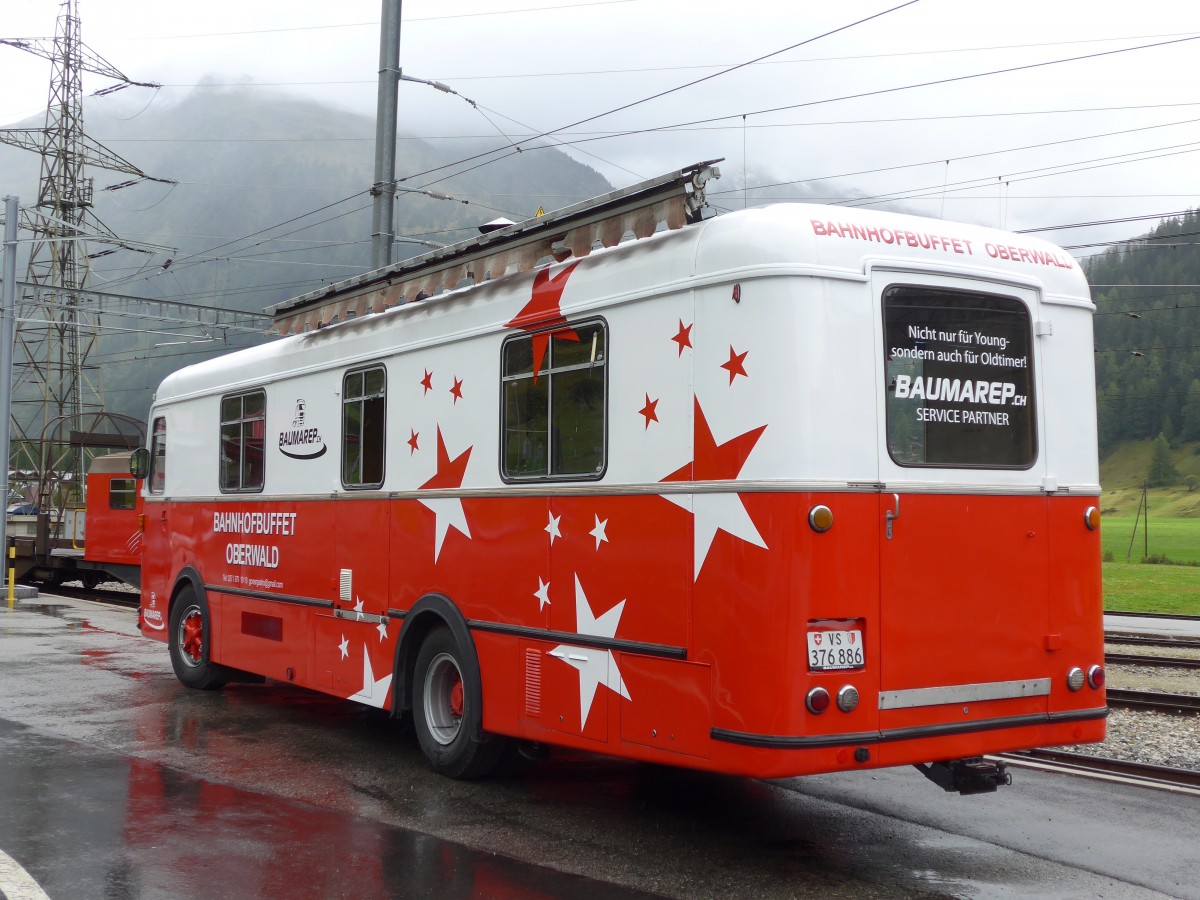 (154'763) - Bahnhofbuffet, Oberwald - VS 376'886 - FBW/Hess (ex Schirmbildwagen, Solothurn) am 1. September 2014 beim Bahnhof Oberwald