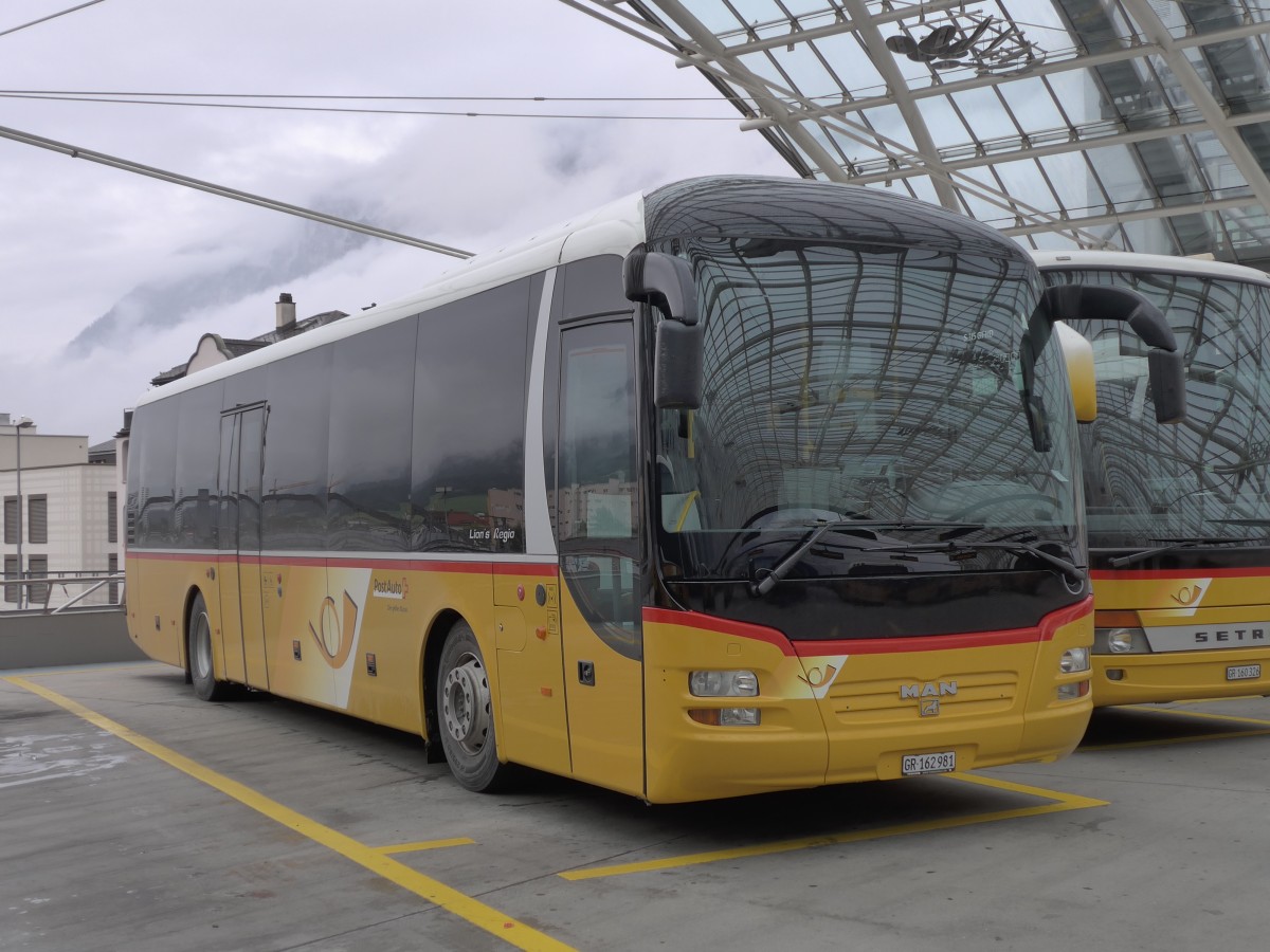 (154'922) - PostAuto Graub�nden - GR 162'981 - MAN am 13. September 2014 in Chur, Postautostation