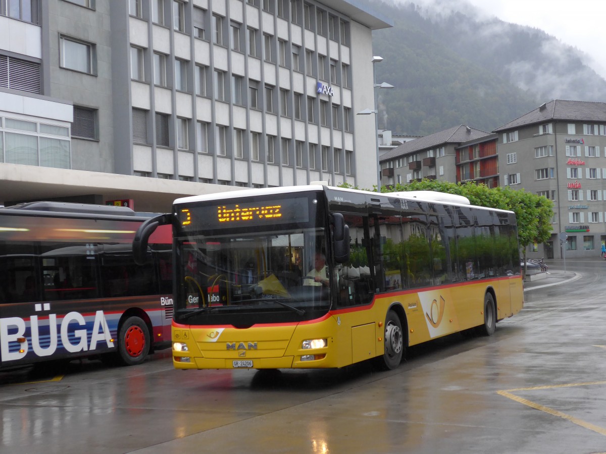 (154'935) - D�nser, Trimmis - GR 24'206 - MAN am 13. September 2014 beim Bahnhof Chur