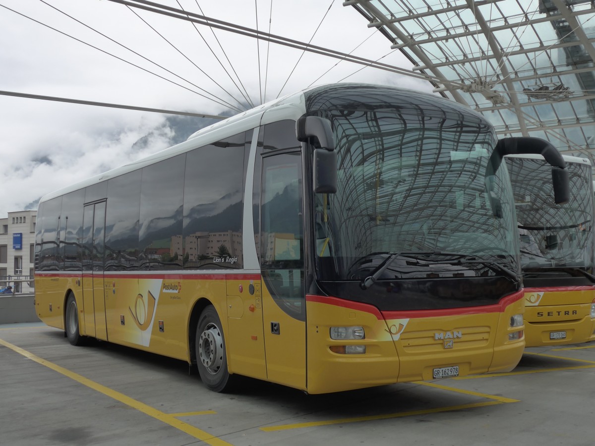 (155'131) - PostAuto Graub�nden - GR 162'978 - MAN am 13. September 2014 in Chur, Postautostation