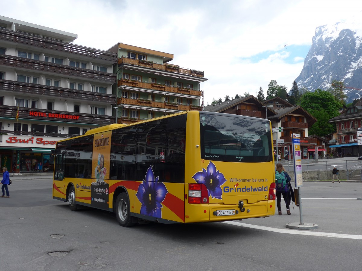 (161'027) - AVG Grindelwald - Nr. 13/BE 407'170 - MAN/G�ppel am 25. Mai 2015 beim Bahnhof Grindelwald