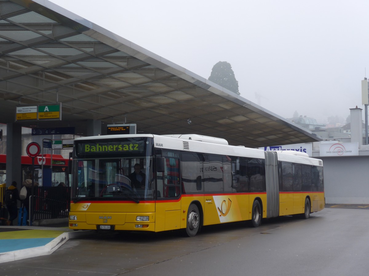 (168'172) - PostAuto Z�rich - Nr. 165/ZH 781'200 - MAN am 1. Januar 2016 beim Bahnhof Horgen