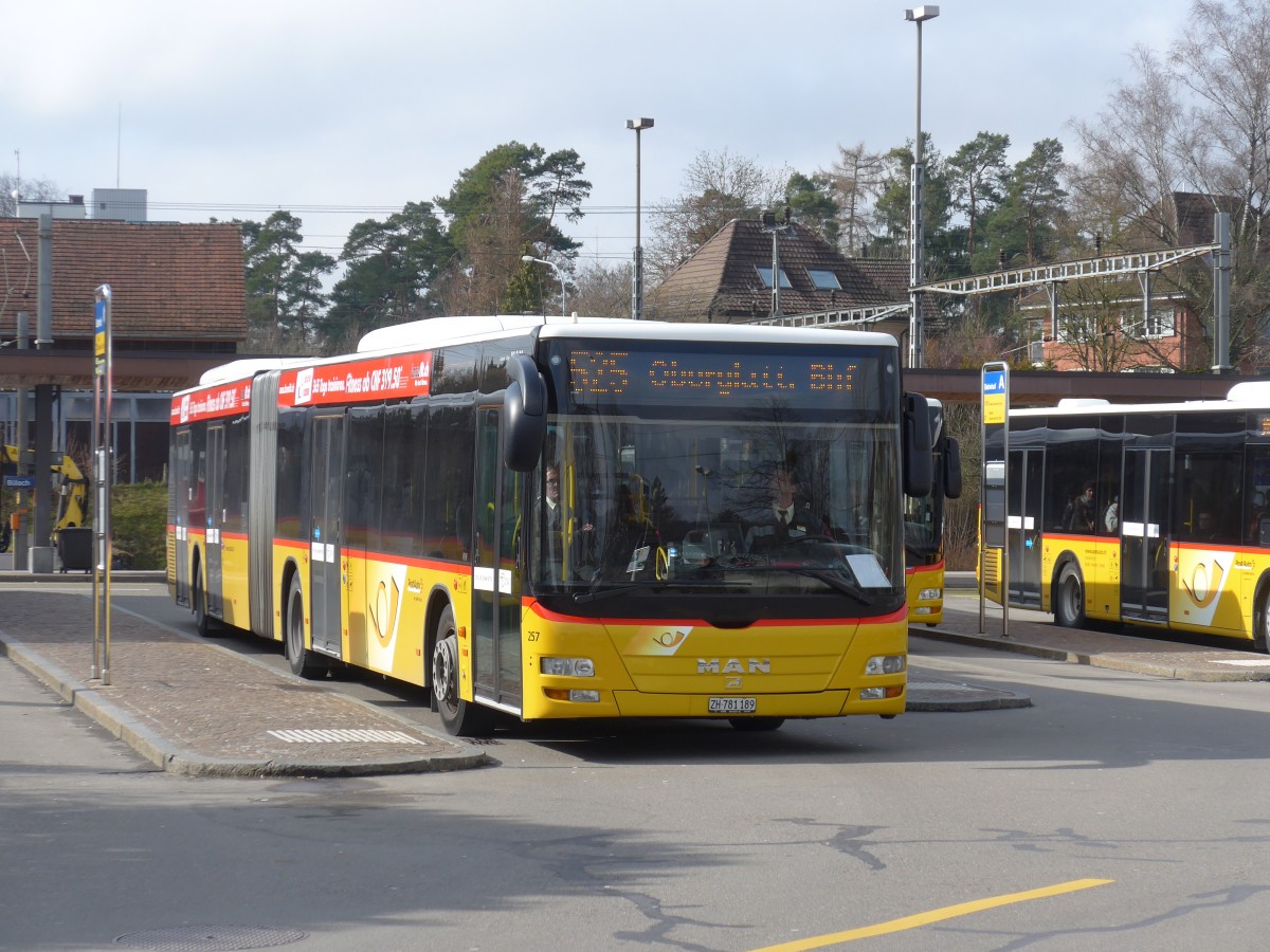 (168'869) - PostAuto Z�rich - Nr. 257/ZH 781'189 - MAN am 24. Februar 2016 beim Bahnhof B�lach