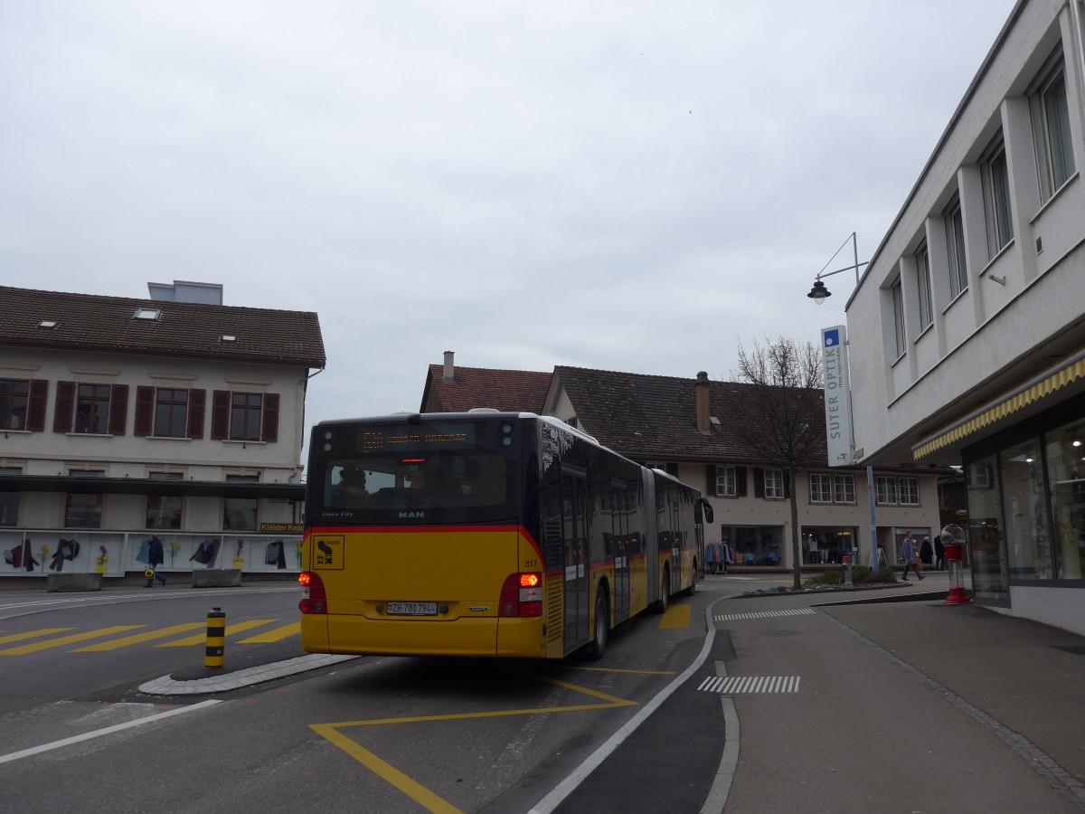 (168'881) - PostAuto Z�rich - Nr. 317/ZH 780'794 - MAN am 24. Februar 2016 in B�lach, Seemattgasse