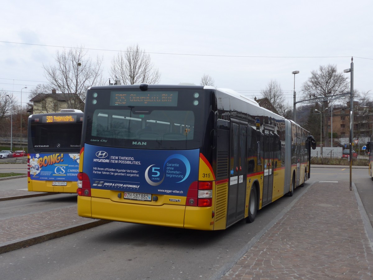 (168'885) - PostAuto Z�rich - Nr. 315/ZH 587'882 - MAN am 24. Februar 2016 beim Bahnhof B�lach