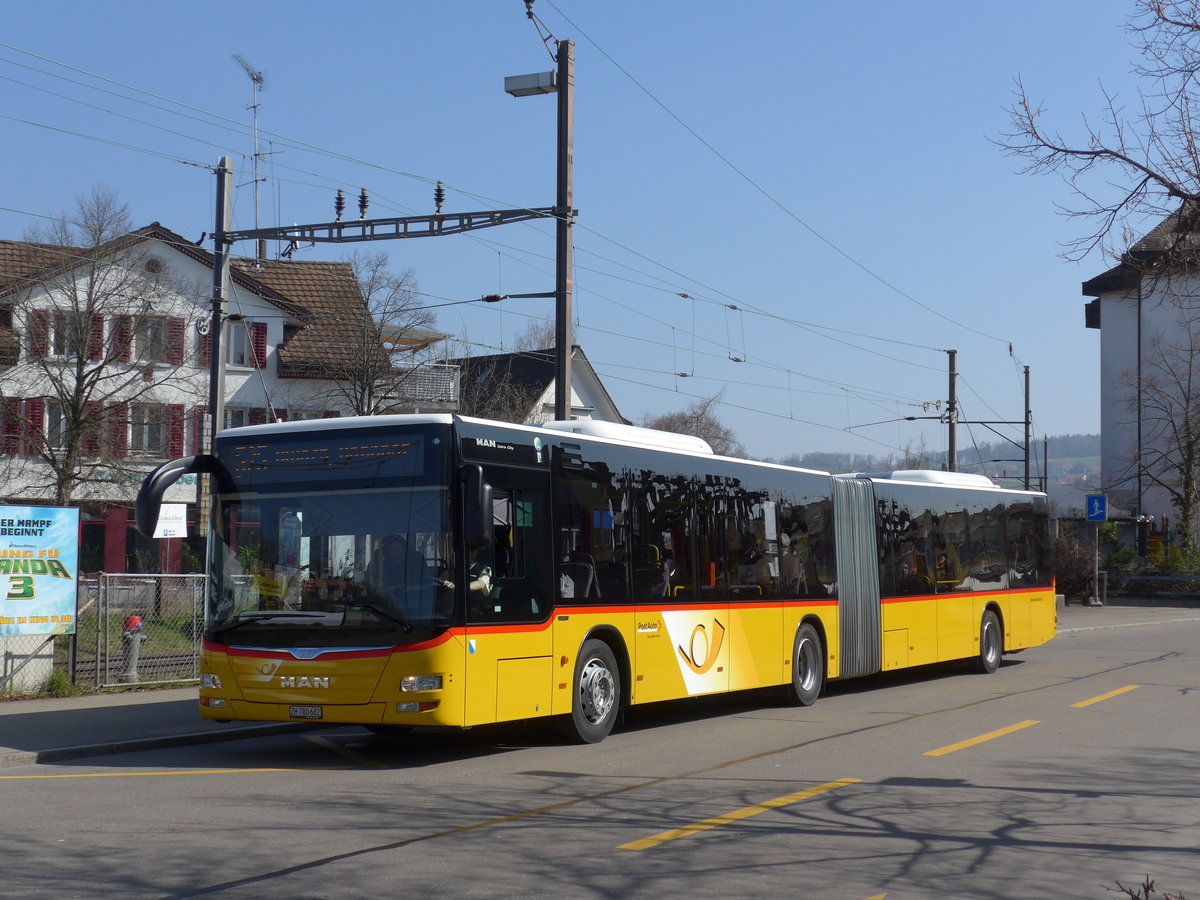 (169'313) - PostAuto Z�rich - Nr. 313/ZH 780'682 - MAN am 19. M�rz 2016 beim Bahnhof B�lach