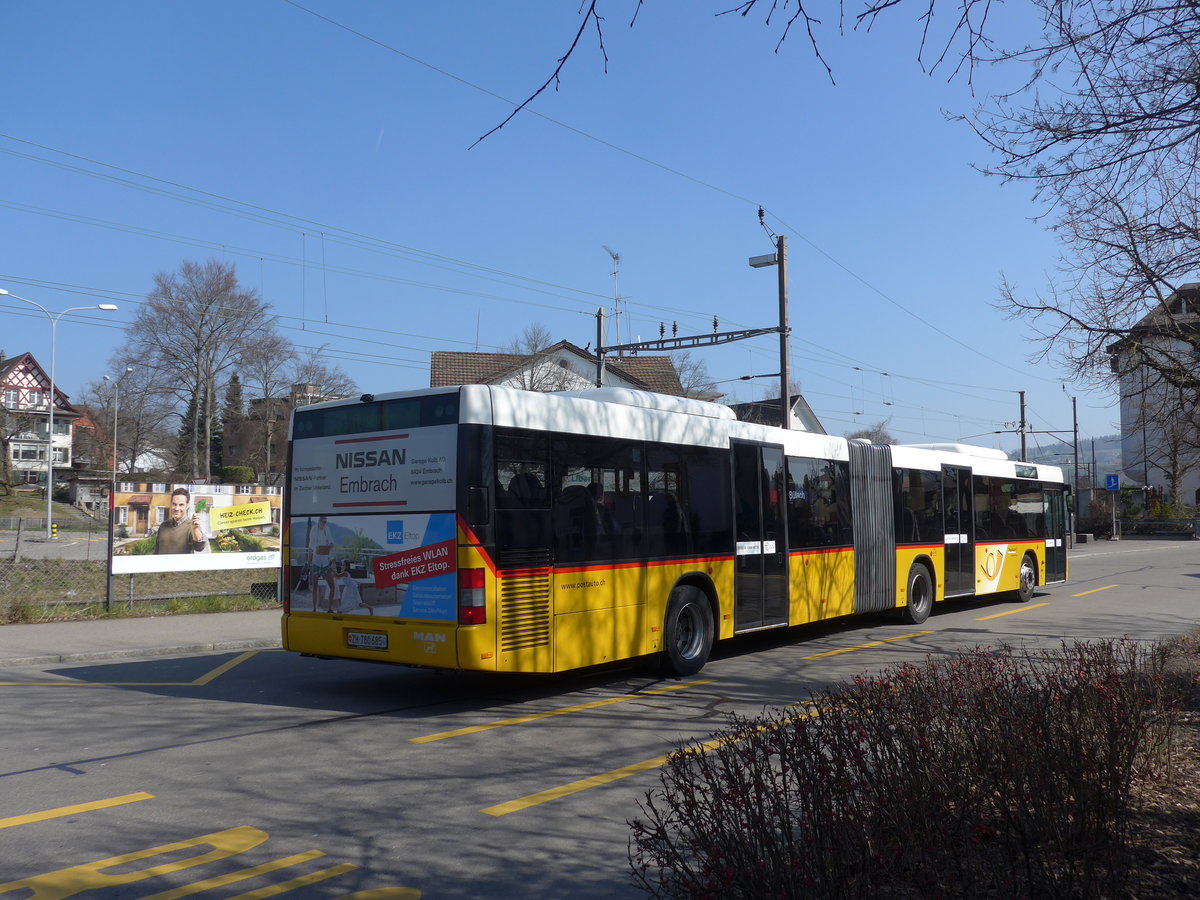 (169'316) - PostAuto Z�rich - Nr. 143/ZH 780'685 - MAN (ex Nr. 20; ex P 26'015) am 19. M�rz 2016 beim Bahnhof B�lach
