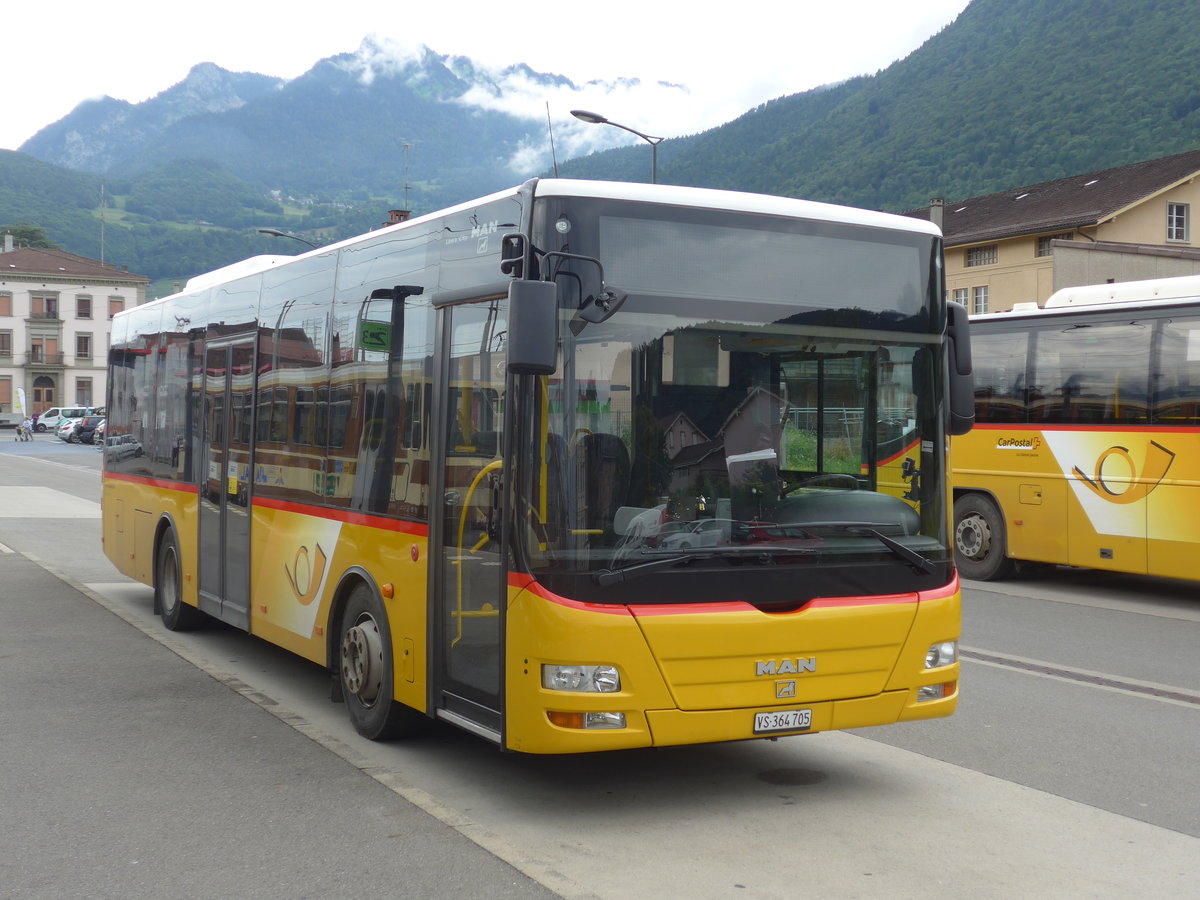 (172'113) - TPC Aigle - VS 364'705 - MAN/G�ppel (ex Evasion, St-Maurice) am 25. Juni 2016 beim Bahnhof Aigle