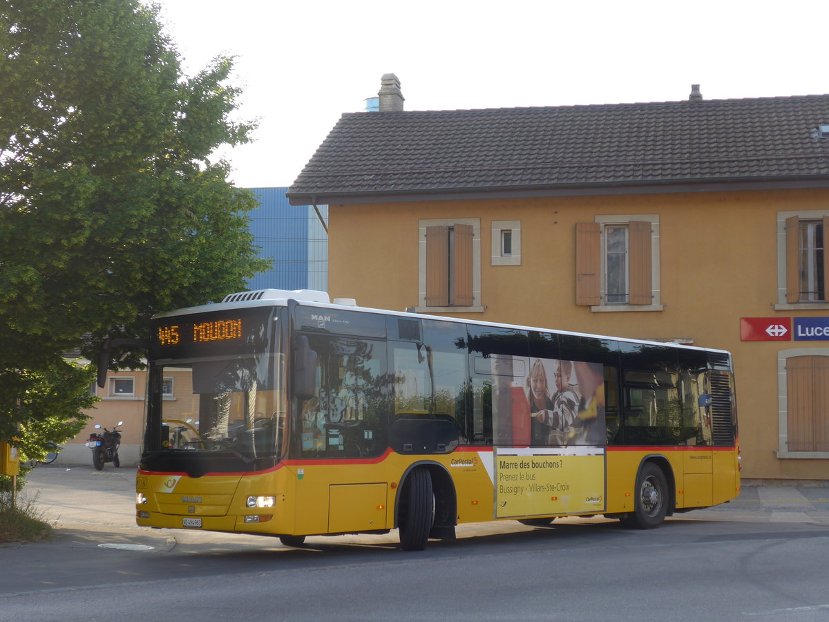 (172'840) - CarPostal Ouest - VD 494'963 - MAN/G�ppel am 11. Juli 2016 beim Bahnhof Lucens