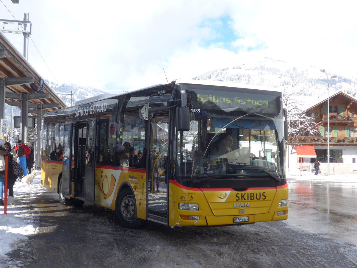 (188'474) - PostAuto Bern - BE 535'079 - MAN/G�ppel (ex Nr. 217; ex RBS Worblaufen Nr. 217) am 12. Februar 2018 beim Bahnhof Gstaad