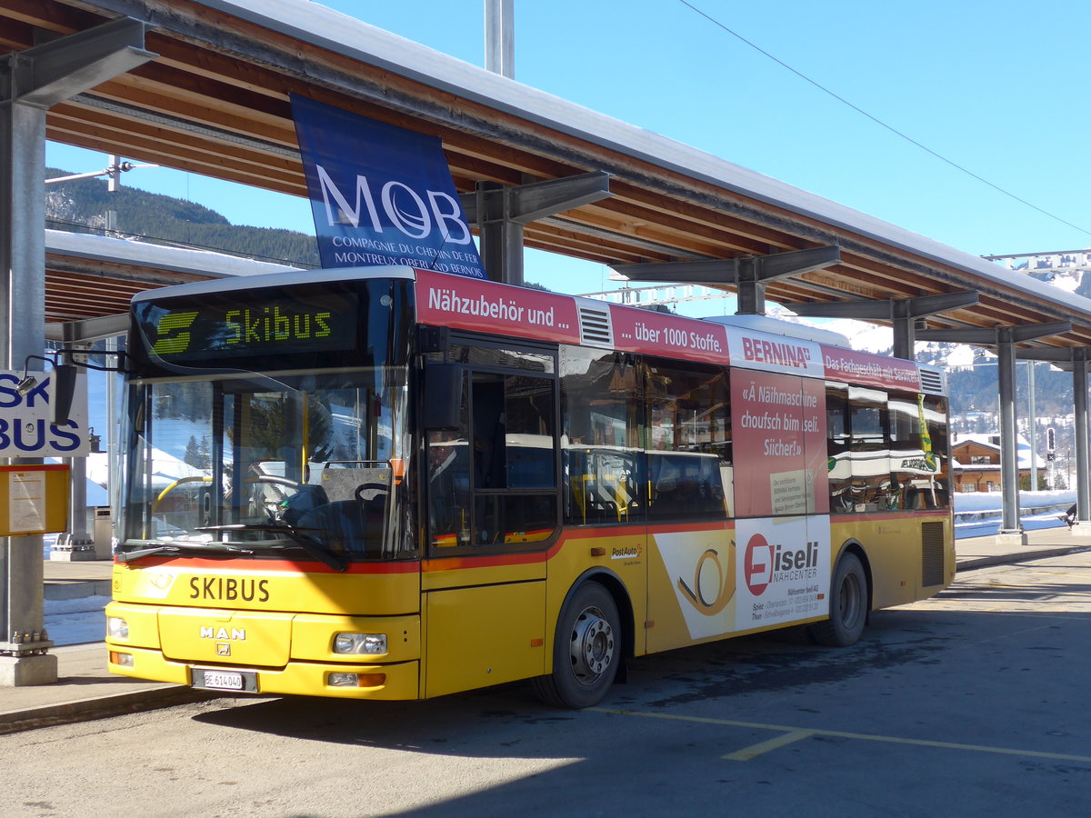 (201'690) - PostAuto Bern - BE 614'040 - MAN/G�ppel (ex AVG Meiringen Nr. 72) am 17. Februar 2019 beim Bahnhof Gstaad