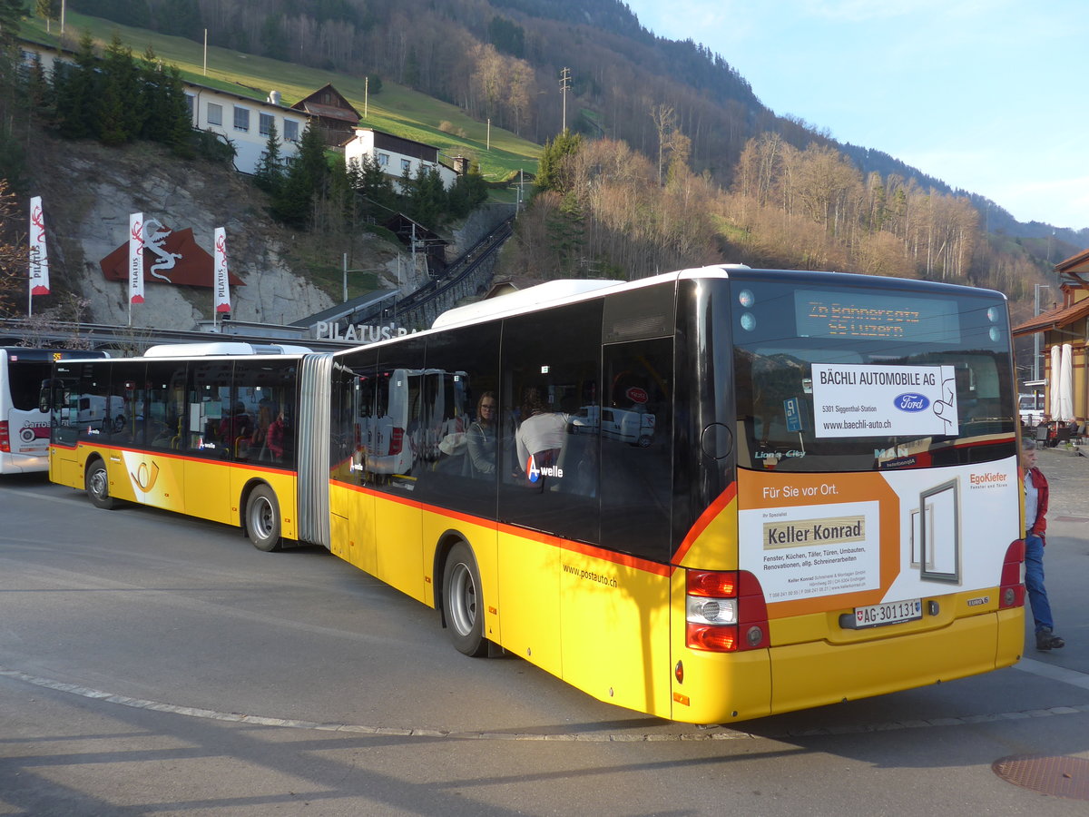 (202'903) - PostAuto Nordschweiz - AG 301'131 - MAN am 22. M�rz 2019 beim Bahnhof Alpnachstad