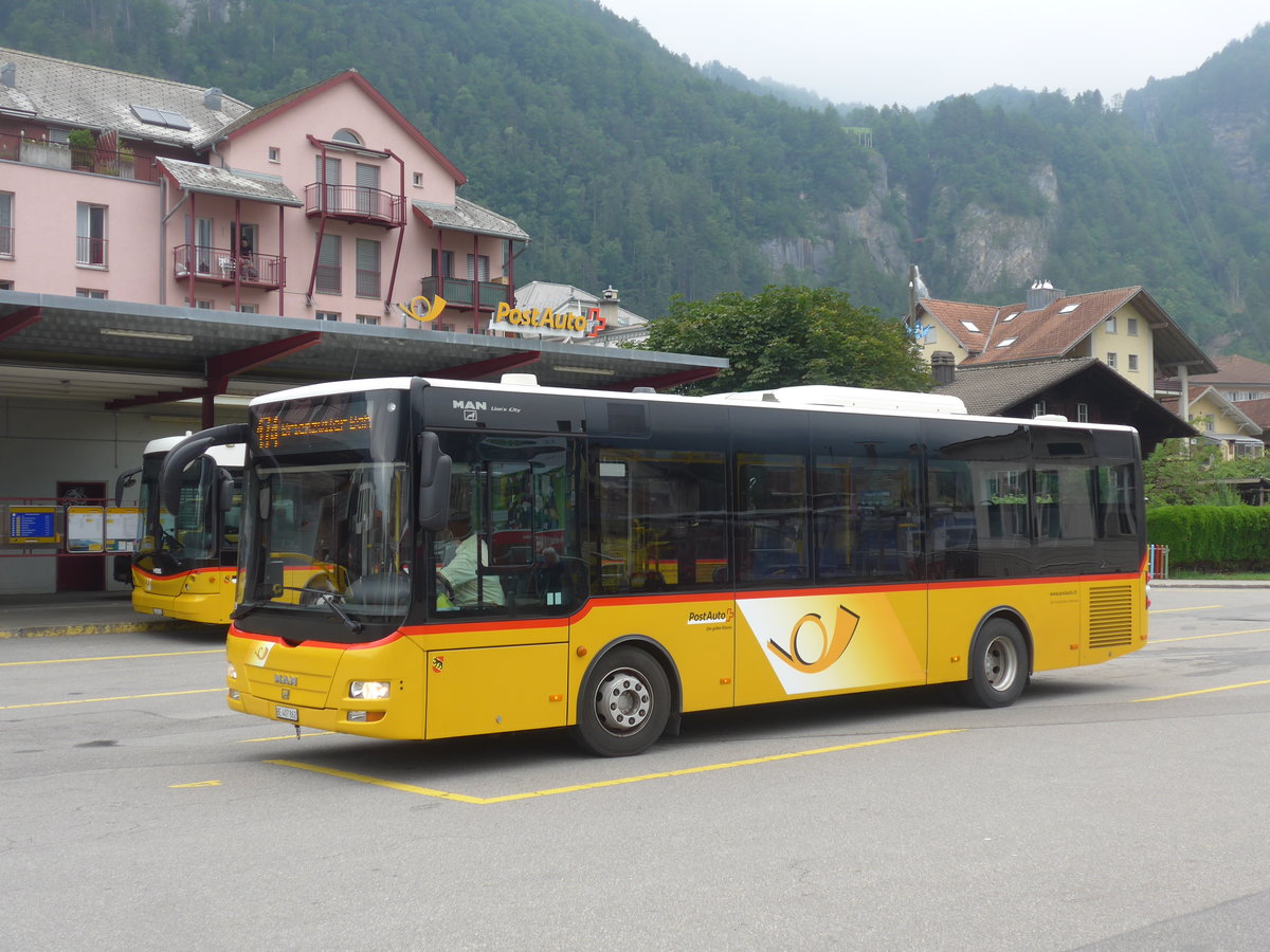 (207'661) - PostAuto Bern - BE 407'862 - MAN/G�ppel (ex AVG Meiringen Nr. 62) am 9. Juli 2019 in Meiringen, Postautostation