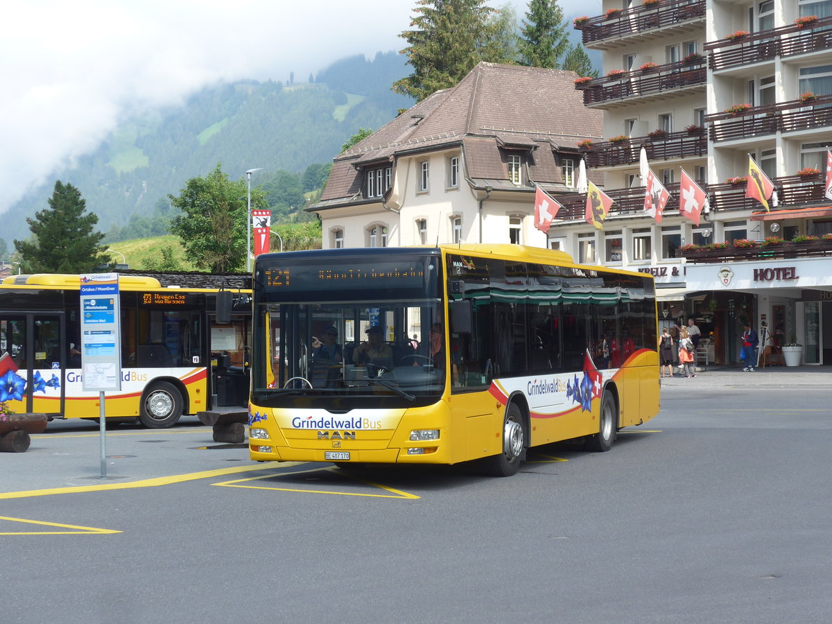 (207'675) - AVG Grindelwald - Nr. 13/BE 407'170 - MAN/G�ppel am 9. Juli 2019 beim Bahnhof Grindelwald