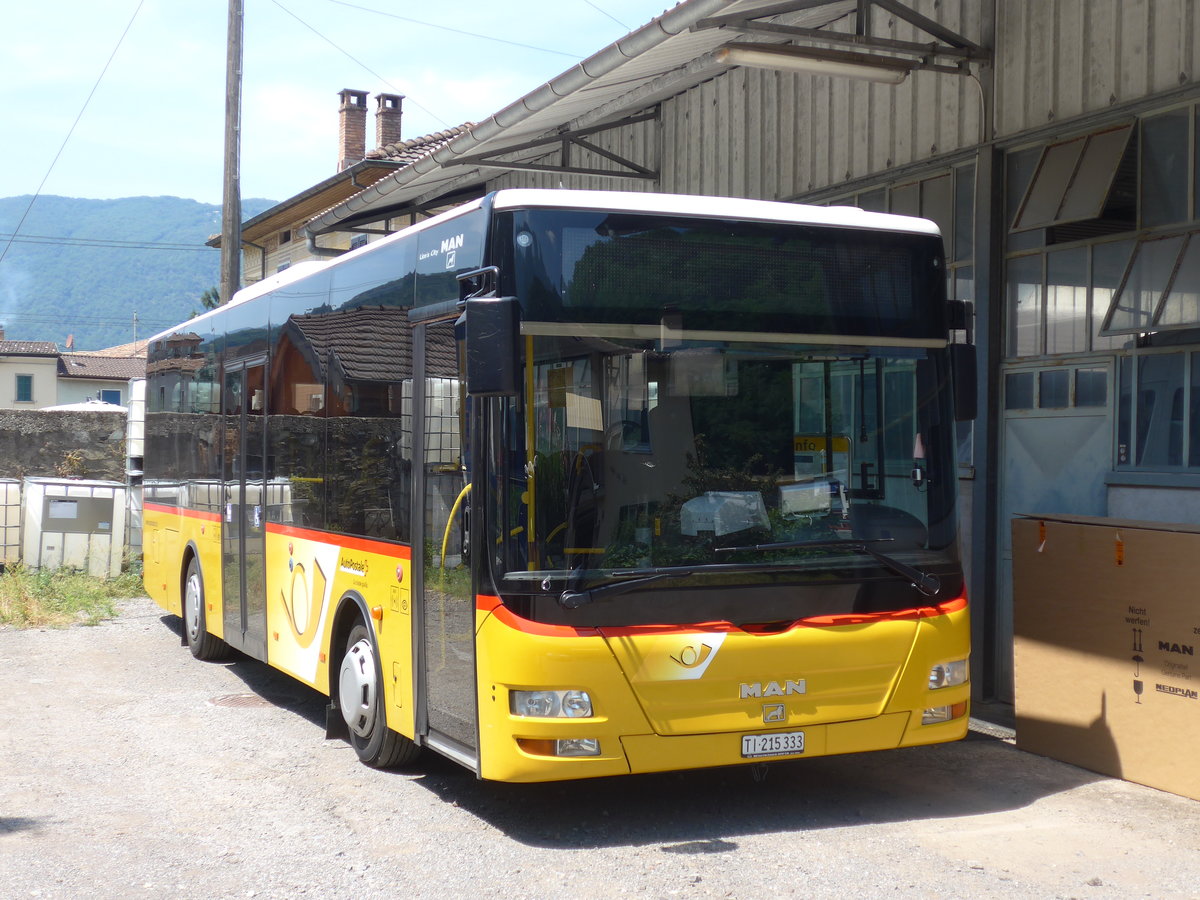 (208'044) - Merzaghi, Maroggia - TI 215'333 - MAN/G�ppel (ex AutoPostale Ticino) am 21. Juli 2019 in Maroggia, Garage